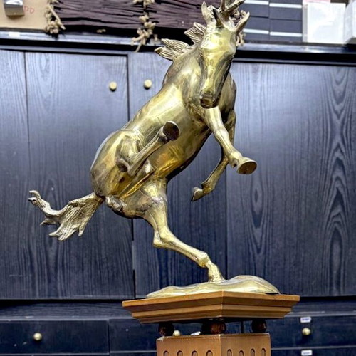Bucephalus brass sculpture on walnut wood base used