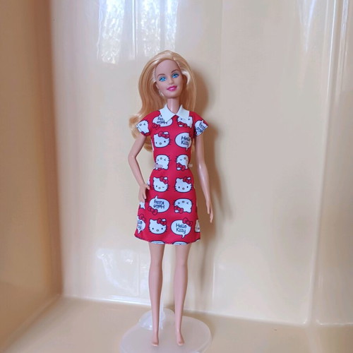 Barbie Fashion Avanue in petite body with Hello Kitty Fashion dress used