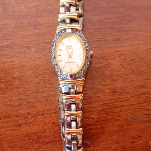 Wristwatch women's like new, gold and silver tones