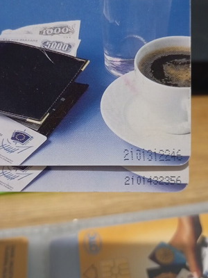 Coffee phone card code 2101 small and large print like new