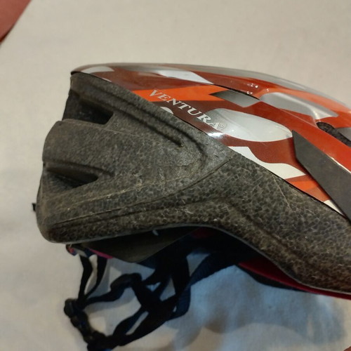 Bicycle helmet used, teen size 54-58 cm with left side wear