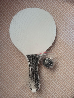Lightweight beach rackets with ball