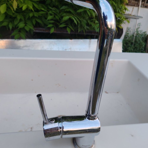 Corian sink with telescopic faucet like new