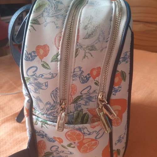 Axel backpack with quilted texture and citrus pattern, like new