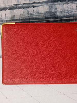 Vintage phone and address directory used, classic red