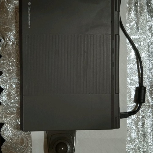 Texas Instruments vintage laptop used, 1980s with charger and mouse