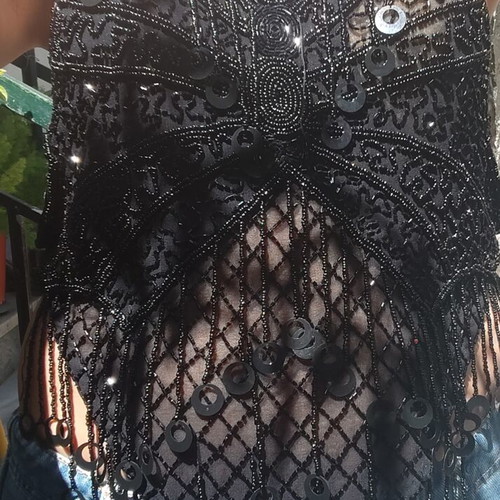 Top with birds and beads like new, black, sizes S and M