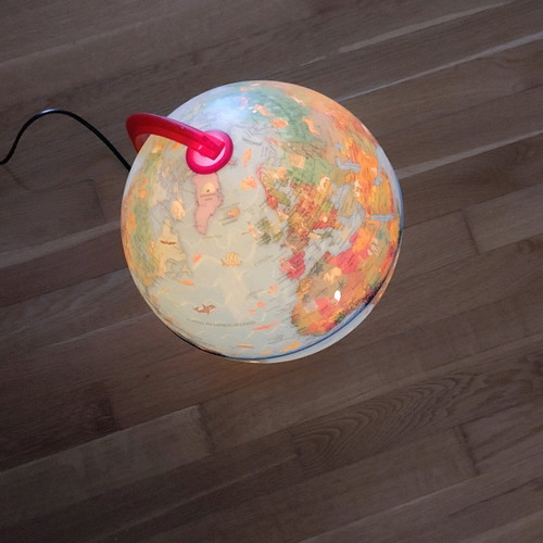 Globe table lamp used with lighting and switch