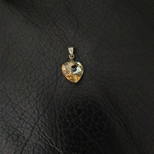 Three heart-shaped charms used, Swarovski crystal, mother of pearl, silver-plated