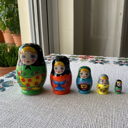 Matryoshka doll collectible like new, set of 5 with unique costumes