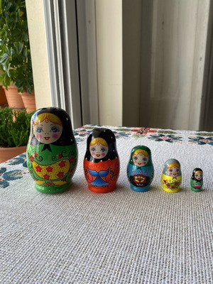 Matryoshka doll collectible like new, set of 5 with unique costumes