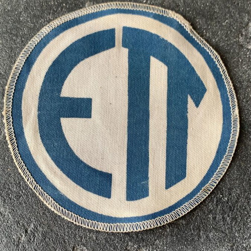 Military insignia used, as shown