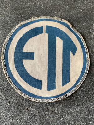 Military insignia used, as shown