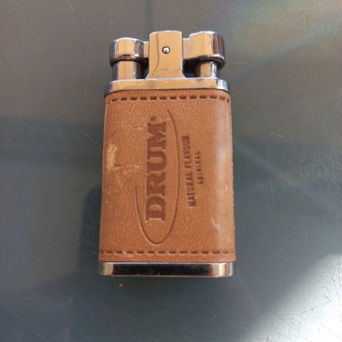 Drum collectible lighter used with leather wear
