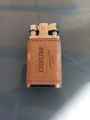 Drum collectible lighter used with leather wear
