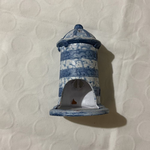 Small striped decorative lighthouse candle holder