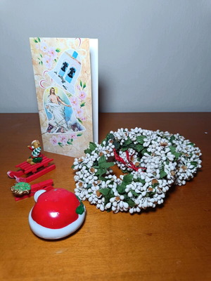 Festive decorations like new, card and 2 fabric pieces
