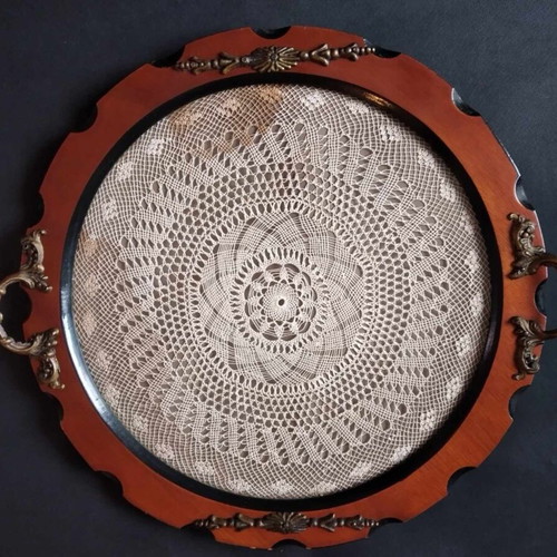 Vintage wooden serving tray used with brass handles