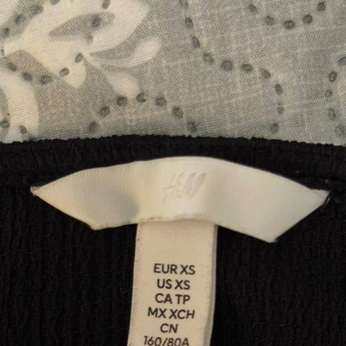 H&M strapless top black XS like new, front knot design