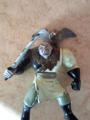 Collectible figure used with signs of wear