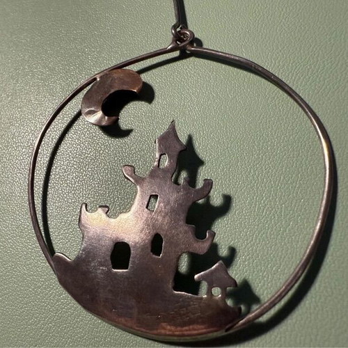 Handmade castle earring like new, silver and gold colors