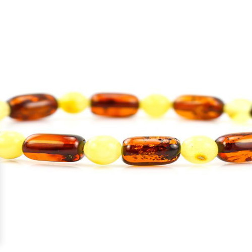 Bracelet made of genuine amber new with cognac cylinders and honey beads