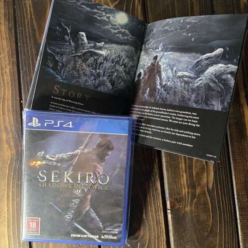 Sekiro Shadows Die Twice PS4 game and artbook