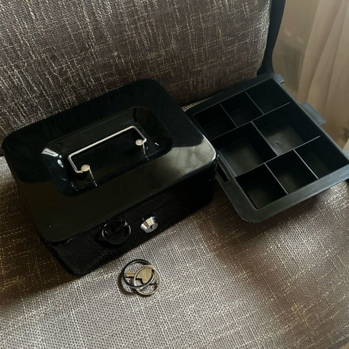 Safe like new with key for money and valuables
