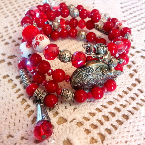 Handmade bracelet with red beads and multiple strands, new