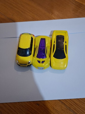 Set of yellow toy cars used