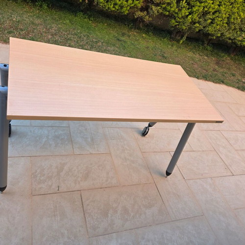 Dromeas desk with wheels used, light wood surface and metal frame