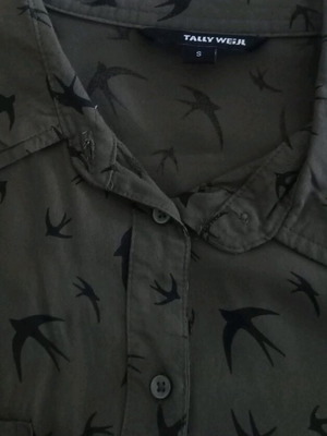 Shirt with swallows in khaki color like new