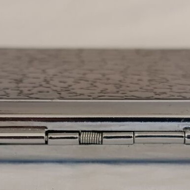 Old cigarette case with built-in lighter used, 1980s metal corporate gift