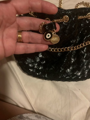 Evening shoulder bag like new, black with gold details