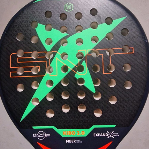 Padel racket used, moderate condition with small cracks