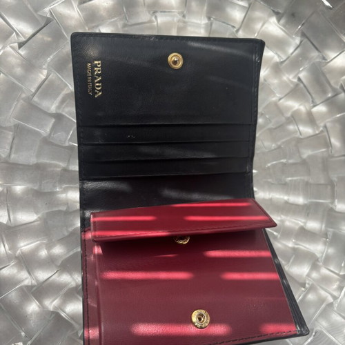 Prada wallet used, black and red