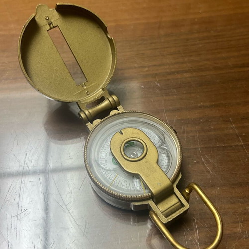 Bronze military-style compass used