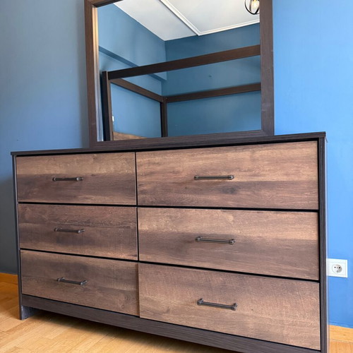 Bedroom furniture set with canopy bed, dresser, mirror, and nightstand