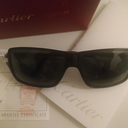 Cartier sunglasses used with box and papers