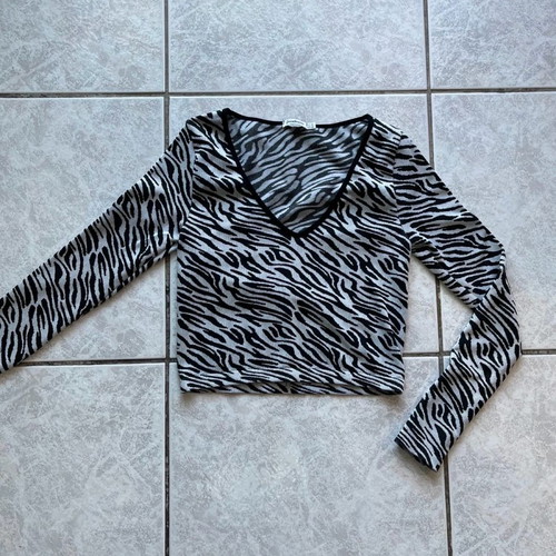 Zebra blouse with V neckline size Small to Medium