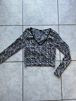 Zebra blouse with V neckline size Small to Medium