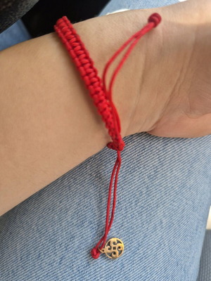 Adjustable red bracelet like new