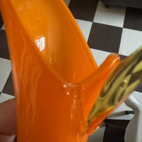 Vintage orange pitcher with slight handle defect