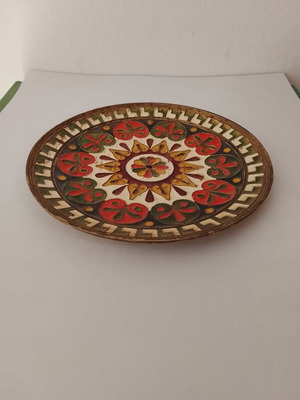 Vintage brass decorative wall plate with enamel coating used
