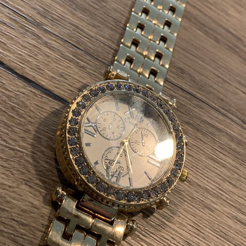 Golden wristwatch, women's