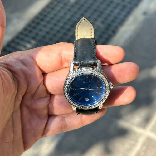 Vintage Pearl wristwatch with blue dial and stones