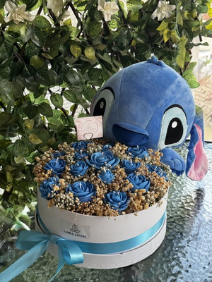 Stitch-themed bouquet candle arrangement