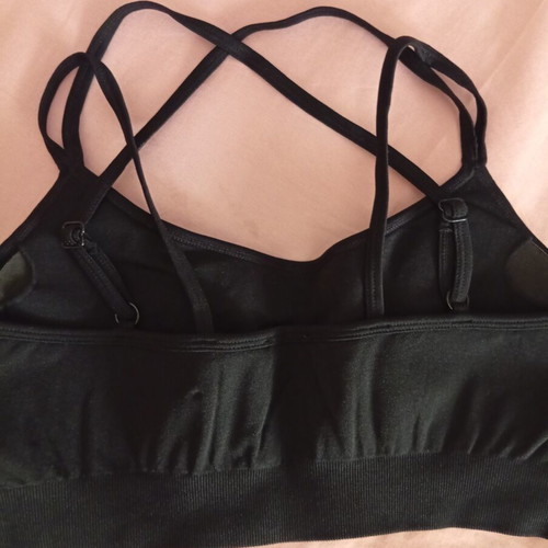 Sports top with chest padding and adjustable cross straps, new, size M-L