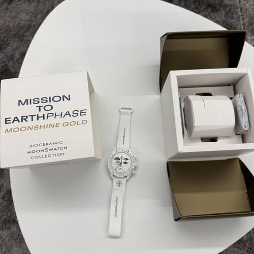 Swatch Omega Mission to Earthphase Moonshine Gold watch, white