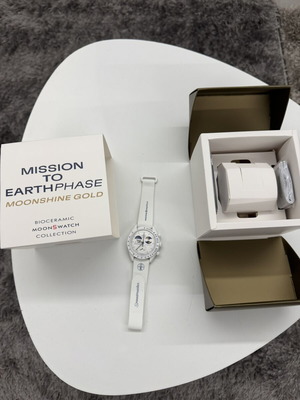 Swatch Omega Mission to Earthphase Moonshine Gold watch, white